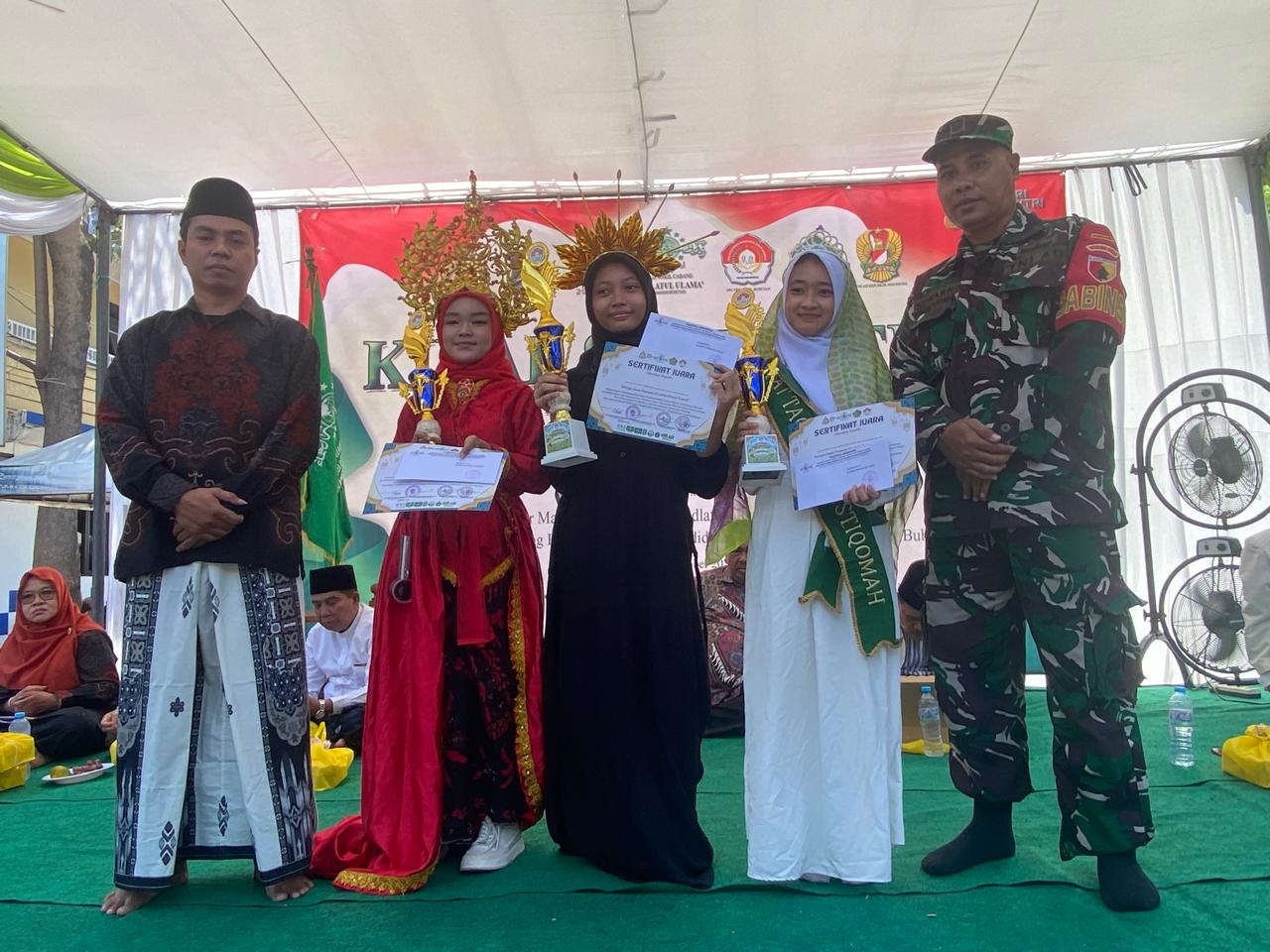 Babinsa Koramil Bubutan Hadiri Pawai
